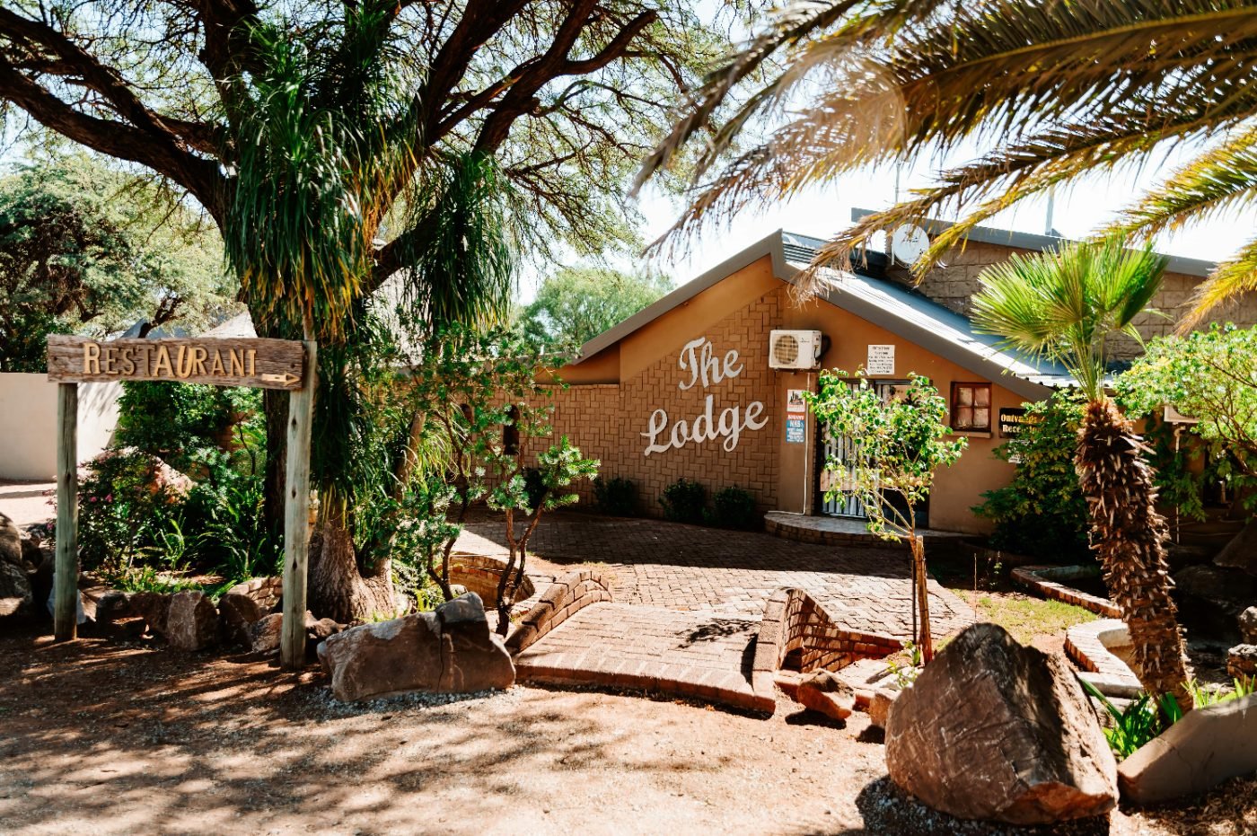 The Lodge entrance under camelthorn trees
